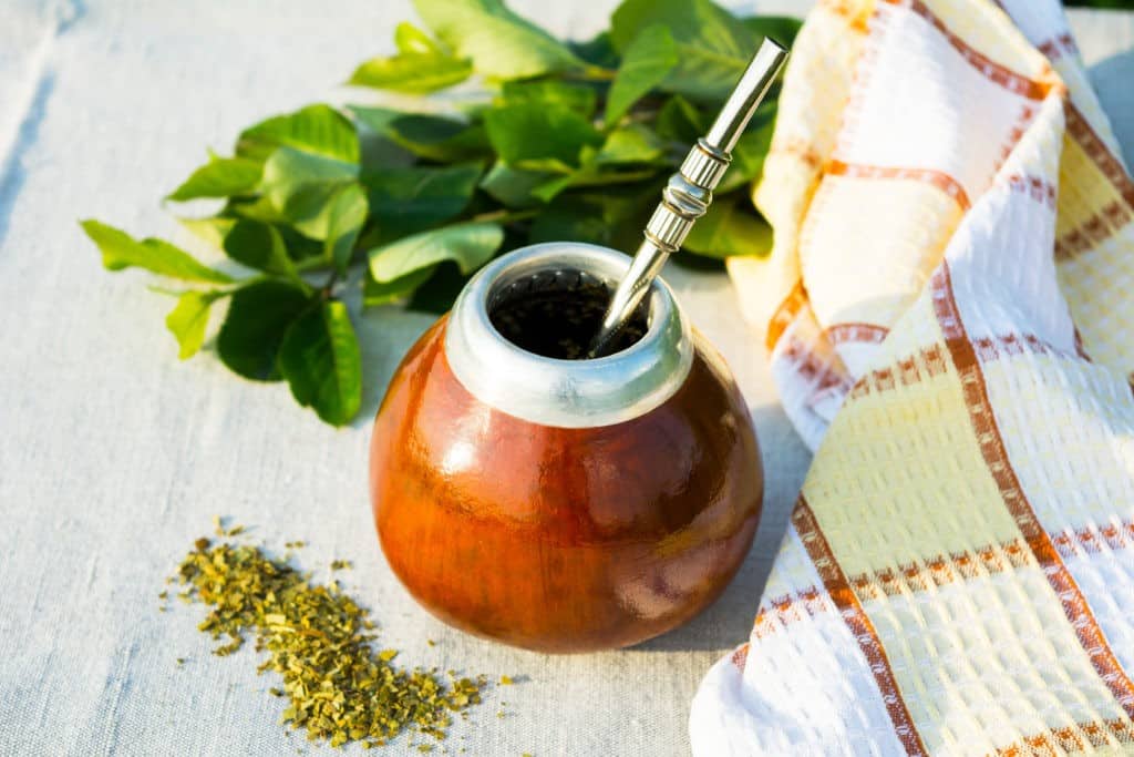 Yerba mate in gourd calabash with bombilla