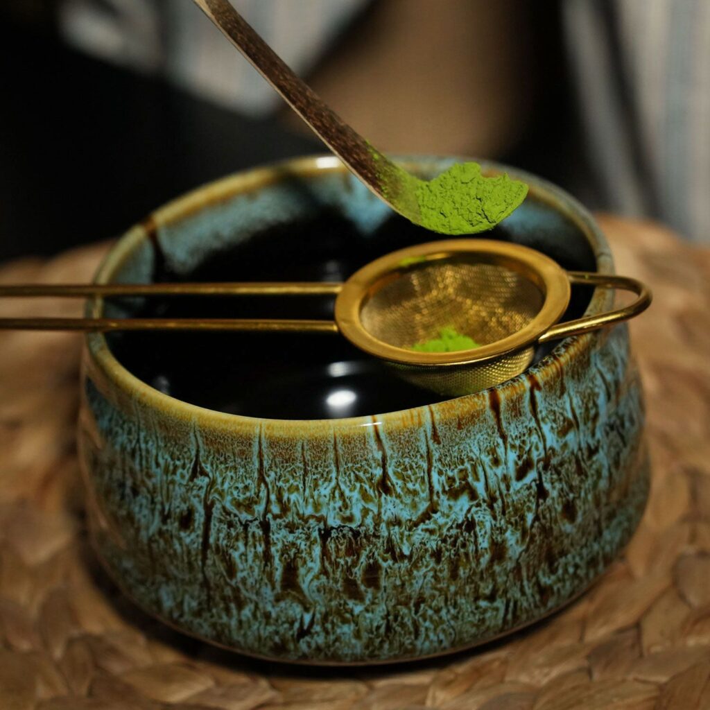 matcha whisk set with matcha whisk and scoop in matcha bowl