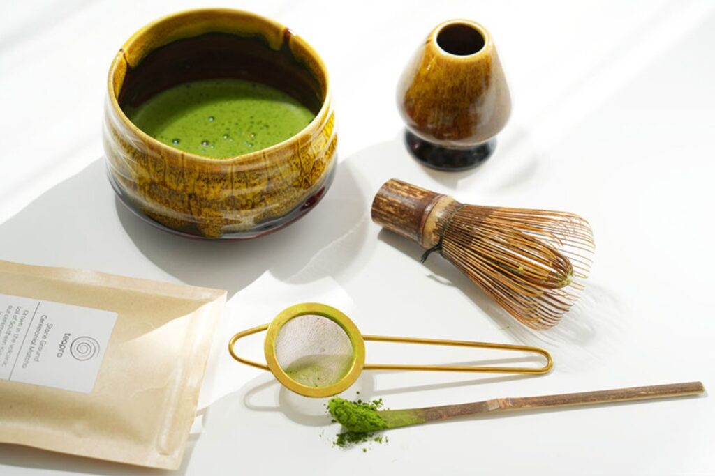 featured image - matcha and L-theanine-bamboo whisk for matcha tea how to clean matcha whisk- how to whisk matcha- how to use a matcha whisk- how to wash matcha whisk- how to bloom matcha whisk- do you have to whisk matcha- how long to whisk matcha- how to make matcha with whisk- how long to soak matcha whisk- how to bloom a matcha whisk-do matcha contain caffeine-does matcha have caffeine-does matcha green tea have caffeine
