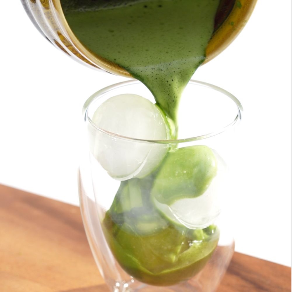 two tone matcha latte recipe - pouring matcha